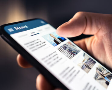 image of a newsfeed on a mobile phone