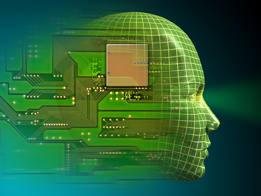 A green wireframe head in profile with a circuit board and microchip overlaid, symbolising AI.