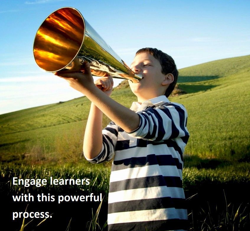 A young boy in a striped shirt shouts into a large golden megaphone in a grassy field.