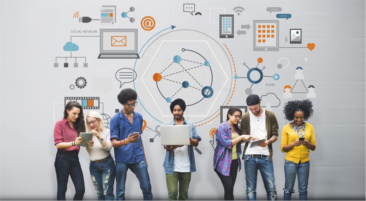 Seven young adults using digital devices, with a network of social media icons above them.