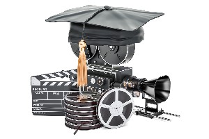 A graduation cap on a vintage film camera, with film reels, a clapperboard, and a megaphone.