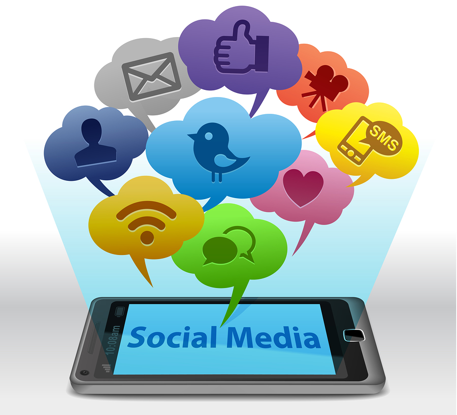 A smartphone with "Social Media" on its screen, from which colourful speech bubbles with social media icons emerge.