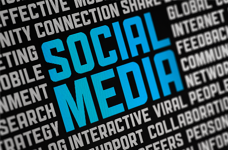 The words SOCIAL MEDIA in large blue letters on a black background, surrounded by smaller white words