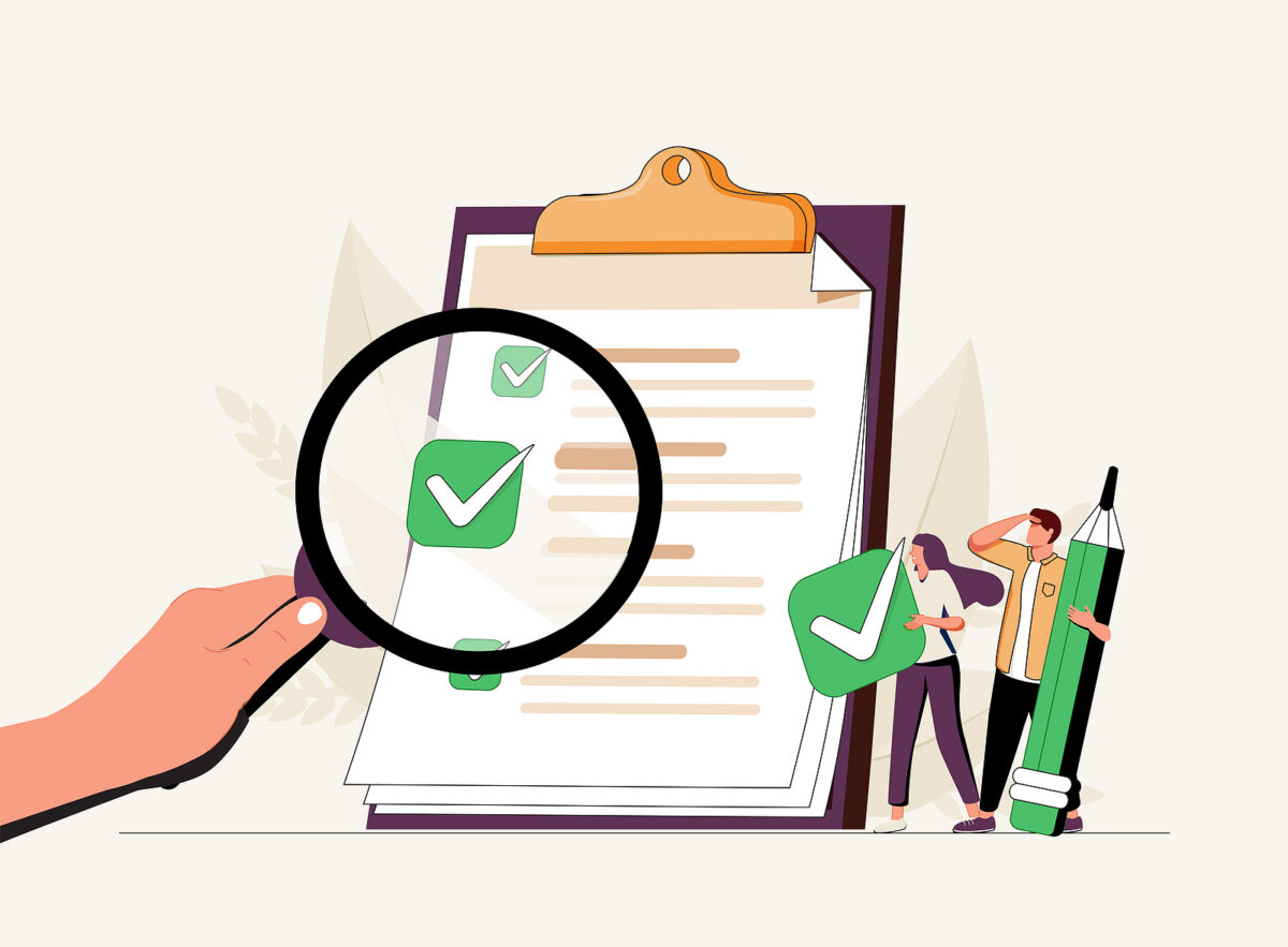 A magnifying glass examines a checklist with green tick marks, while two people hold a large tick and pencil.