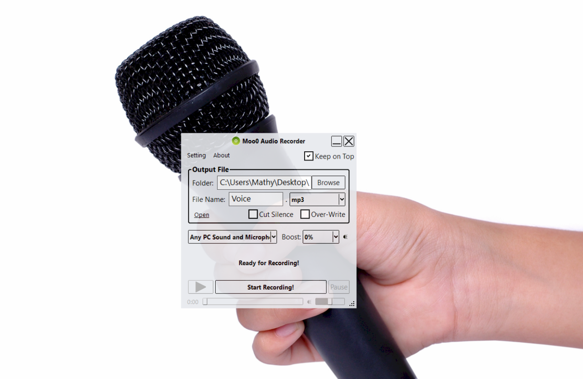 Screenshot of Moo0 Audio Recorder software over a hand holding a microphone, showing output file settings.