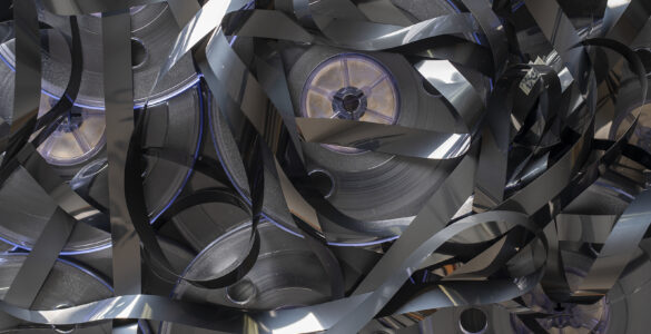 image showing vintage magnetic video reels on background