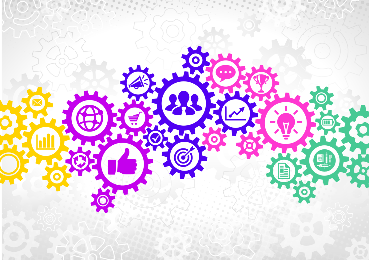 A collection of colourful gears with various icons representing media literacy concepts.