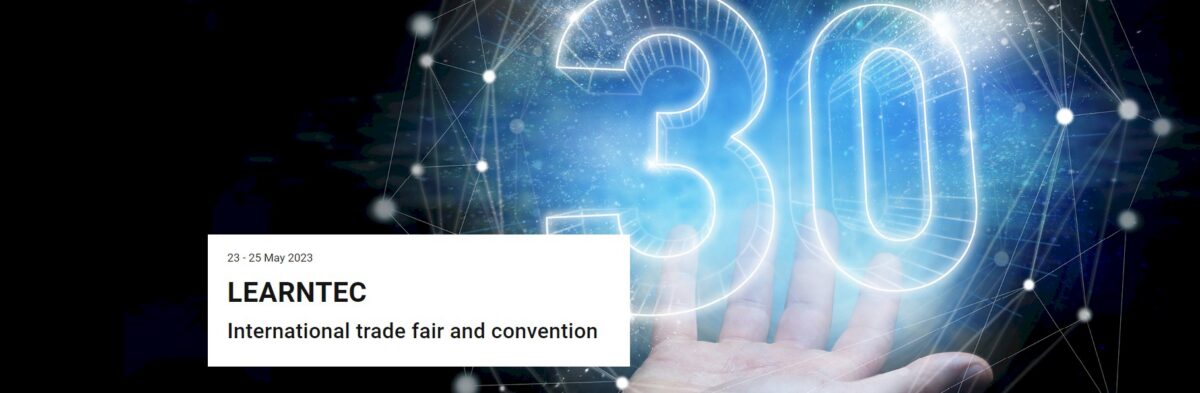 Text reads: 23 - 25 May 2023, LEARNTEC, International trade fair and convention. A hand holds a glowing 30.