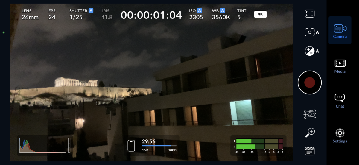 Screenshot of a Blackmagic camera app interface showing camera settings and a night view of the Acropolis.