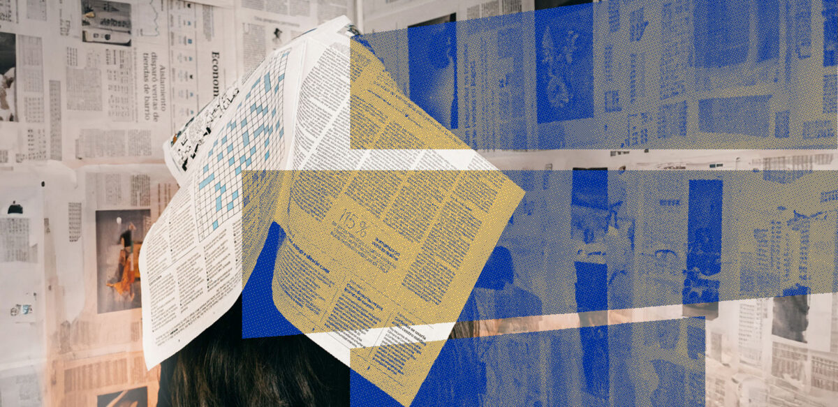 A person holding a newspaper, with blue and yellow filters over the image.