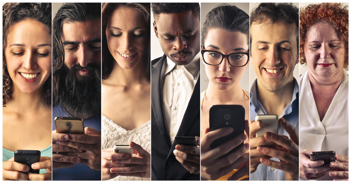 A collage of seven people of diverse ages and ethnicities, each looking down at and holding a smartphone.
